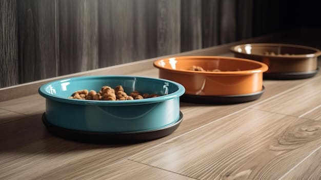 Three separate dog bowls on a kitchen floor, each containing food. The bowls are spaced apart to prevent competition and resource guarding.