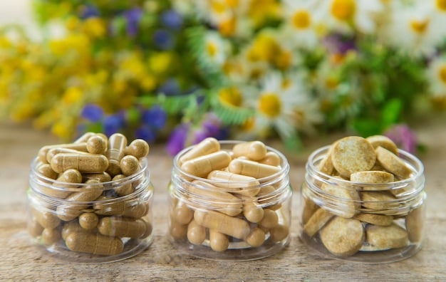 A close-up shot of a diverse array of probiotic supplements for pets, including capsules, powders, and chews. The supplements are arranged on a clean, white surface, highlighting their variety and availability.