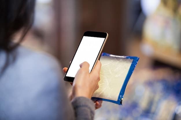 A close-up shot of a smartphone displaying a retailer's app with available digital coupons for pet food and supplies. The screen also shows the user's loyalty program points balance.